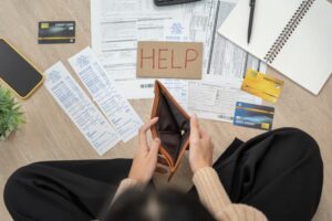 Someone sat around receipts and credit cards with an empty wallet, wondering how IVAs work